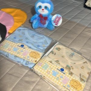 NWT (baby clothes) size3-6 and/ 6-12+ 4-hats and animal stuff
